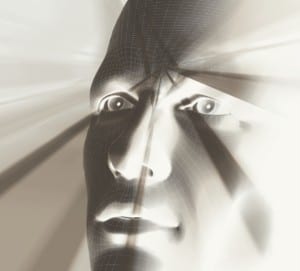 Human head with streaming currents of light from third eye - third eye center